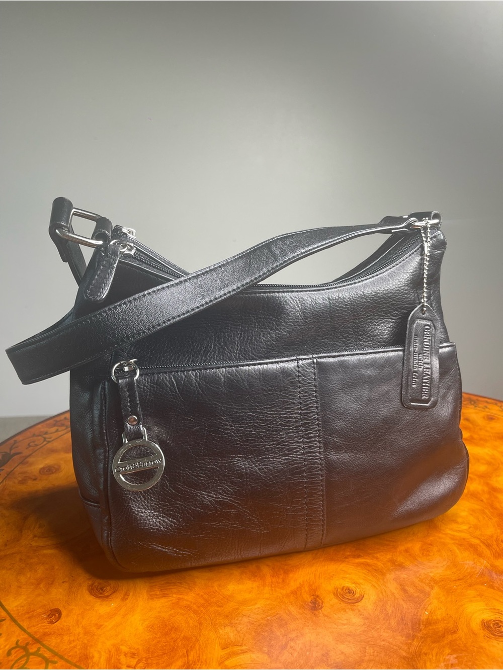 Black Leather Shoulder Bag with Tag Accent
